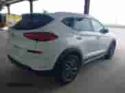 2021 Hyundai Tucson SEL with VIN KM8J33AL1MU410497, listed as a IAAI auction lot 41886299 with 224,137 mi miles and . Bid and sale history available at DreamBid. Image 4.