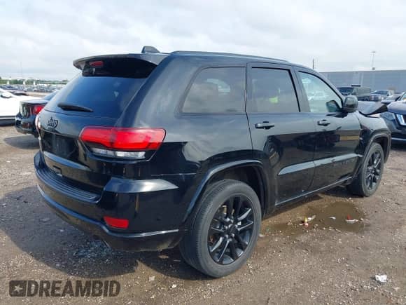 2021 Jeep Grand Cherokee Laredo E with VIN 1C4RJEAG0MC571375, listed as a IAAI auction lot 42087648 with 29,358 mi miles and . Bid and sale history available at DreamBid. Image 4.