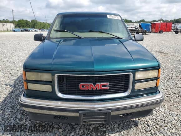 1998 GMC Sierra 1500 с VIN 1GTEC14M9WZ552035, выставлен на аукционе Copart как лот 69945255 с пробегом 234 454 миль миль и Списание • Salvage title. История ставок и продаж доступна на DreamBid. Изображение 5.