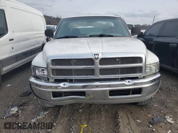 2001 Dodge RAM with VIN 3B6KC26Z31M511545, listed as a Copart auction lot 82887004 with 194,049 mi miles and Salvage title. Bid and sale history available at DreamBid. Image 5.