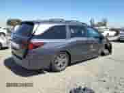 2025 Honda Odyssey Touring with VIN 5FNRL6H81SB050213, listed as a Copart auction lot 66870095 with 1,339 mi miles and Salvage title. Bid and sale history available at DreamBid. Image 3.