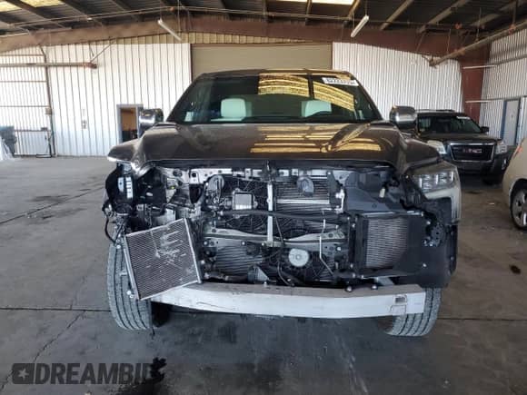 2024 Toyota Tundra Capstone Hybrid with VIN 5TFVC5DB9RX056156, listed as a Copart auction lot 82223795 with 21,135 mi miles and Salvage title. Bid and sale history available at DreamBid. Image 5.