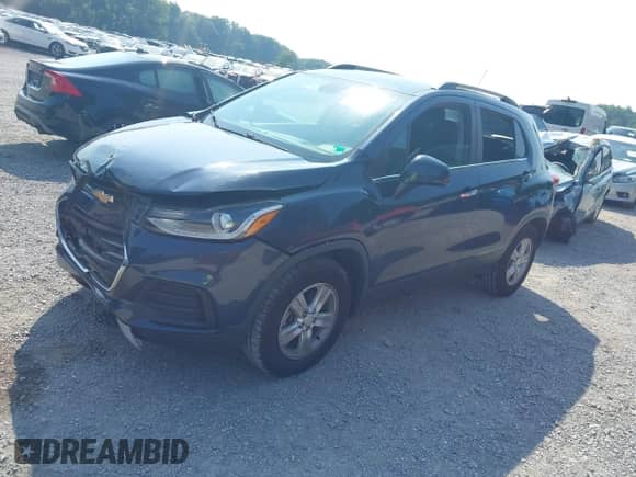 2018 Chevrolet Trax LT z VIN 3GNCJPSB4JL354360, wystawiony jako IAAI lot #42559298 z przebiegiem 61 449 mil mil oraz . Historia ofert i sprzedaży dostępna na DreamBid. Obrazek 2.