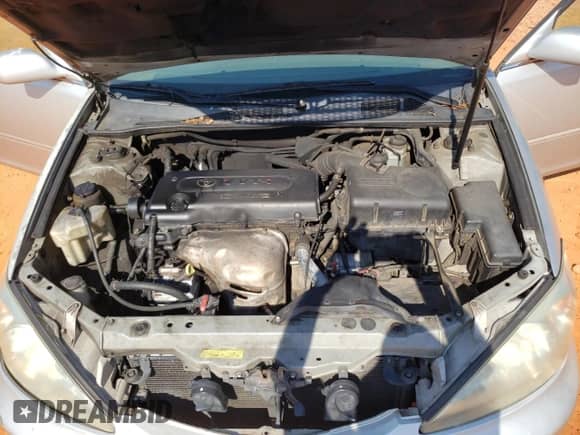 2003 Toyota Camry LE с VIN 4T1BE32K63U746598, выставлен на аукционе Copart как лот 71235295 с пробегом 365 622 миль миль и Списание • Salvage title. История ставок и продаж доступна на DreamBid. Изображение 11.