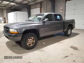 2002 Dodge Dakota Sport с VIN 1B7HG38N02S587775, выставлен на аукционе Copart как лот 53423675 с пробегом 188 900 миль миль и Списание • Salvage title. История ставок и продаж доступна на DreamBid. Изображение 1.