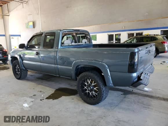 2006 GMC Sierra 1500 SLT with VIN 1GTEK19B46Z209658, listed as a Copart auction lot 54836765 with 207,851 mi miles and Salvage title. Bid and sale history available at DreamBid. Image 2.