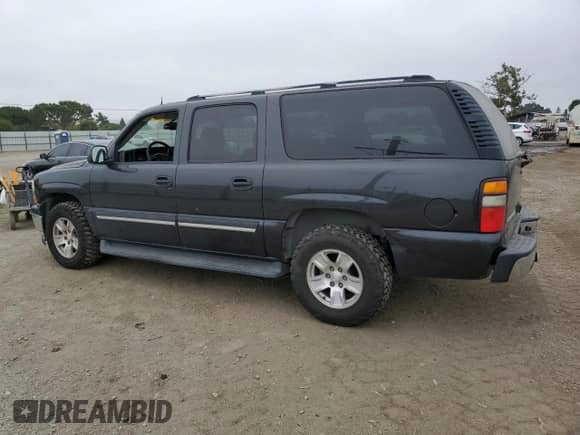 2005 Chevrolet Suburban LT z VIN 3GNEC16Z35G123374, wystawiony jako Copart lot #62396585 z przebiegiem 244 078 mil mil oraz Czysty tytuł • Clean title. Historia ofert i sprzedaży dostępna na DreamBid. Obrazek 2.