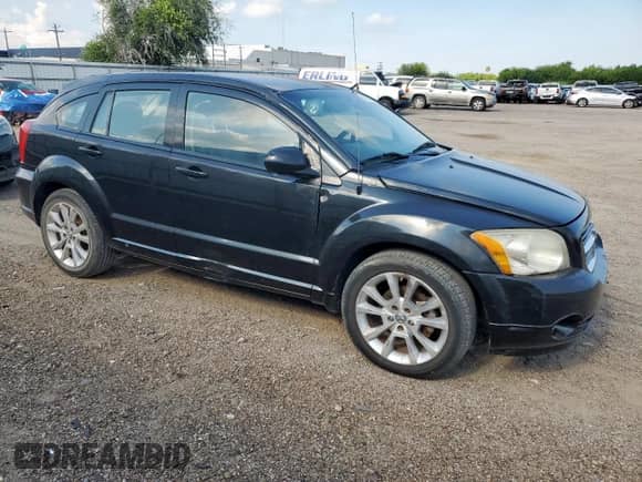 2011 Dodge Caliber Heat with VIN 1B3CB5HA5BD173009, listed as a Copart auction lot 70210775 with 181,919 mi miles and Clean title. Bid and sale history available at DreamBid. Image 4.