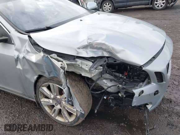 2012 Volvo S60 T6 с VIN YV1902FH7C2105461, выставлен на аукционе IAAI как лот 41323392 с пробегом 98 059 миль миль и . История ставок и продаж доступна на DreamBid. Изображение 6.