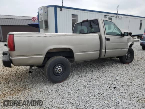 2000 Chevrolet Silverado 2500 с VIN 1GCGC24R5YR128980, выставлен на аукционе Copart как лот 59560145 с пробегом 169 673 миль миль и На запчасти • Non repairable. История ставок и продаж доступна на DreamBid. Изображение 3.