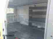 2011 Ford Econoline Cargo Commercial z VIN 1FTNE2EW3BDA84925, wystawiony jako IAAI lot #43294364 z przebiegiem 146 373 mil mil oraz . Historia ofert i sprzedaży dostępna na DreamBid. Obrazek 8.