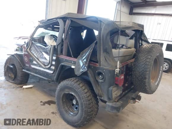 2001 Jeep Wrangler SE with VIN 1J4FA29P01P372136, listed as a IAAI auction lot 42013962 with 163,732 mi miles and . Bid and sale history available at DreamBid. Image 3.