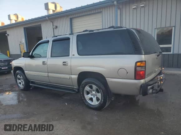 2005 Chevrolet Suburban LS with VIN 3GNFK16Z75G127872, listed as a Copart auction lot 77887864 with 201,471 mi miles and Salvage title. Bid and sale history available at DreamBid. Image 2.