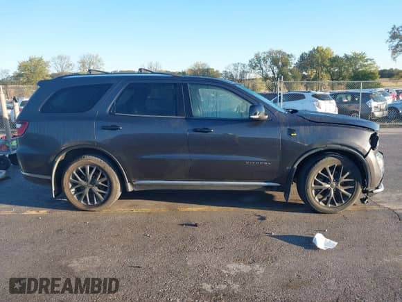 2015 Dodge Durango Citadel with VIN 1C4SDJET7FC843237, listed as a IAAI auction lot 43386175 with 160,070 mi miles and . Bid and sale history available at DreamBid. Image 13.