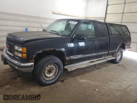 1995 GMC Sierra 1500 with VIN 1GTEK19K3SE548039, listed as a Copart auction lot 58201755 with 124,841 mi miles and Clean title. Bid and sale history available at DreamBid. Image 1.