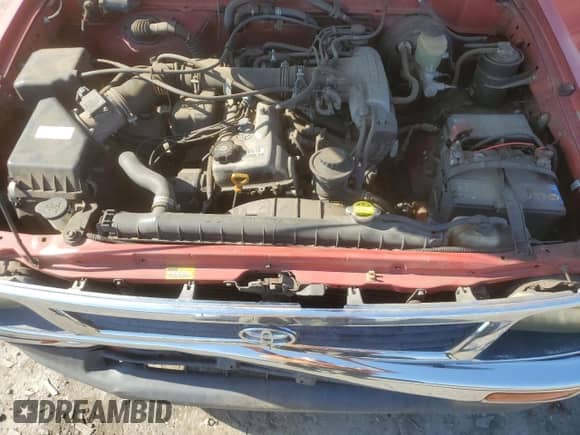 1995 Toyota Tacoma z VIN 4TAUN53B9SZ077425, wystawiony jako Copart lot #70768285 z przebiegiem 124 789 mil mil oraz Czysty tytuł • Clean title. Historia ofert i sprzedaży dostępna na DreamBid. Obrazek 11.