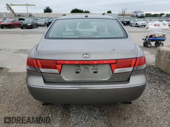 2008 Hyundai Azera Limited z VIN KMHFC46F28A334309, wystawiony jako Copart lot #51693325 z przebiegiem 193 535 mil mil oraz Szkoda całkowita • Salvage title. Historia ofert i sprzedaży dostępna na DreamBid. Obrazek 6.