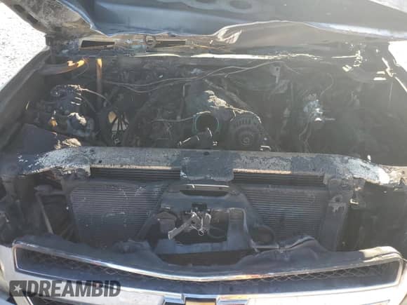 2011 Chevrolet Suburban with VIN 1GNWK5EG5BR230131, listed as a Copart auction lot 82959184 with Not provided miles and Salvage title. Bid and sale history available at DreamBid. Image 12.