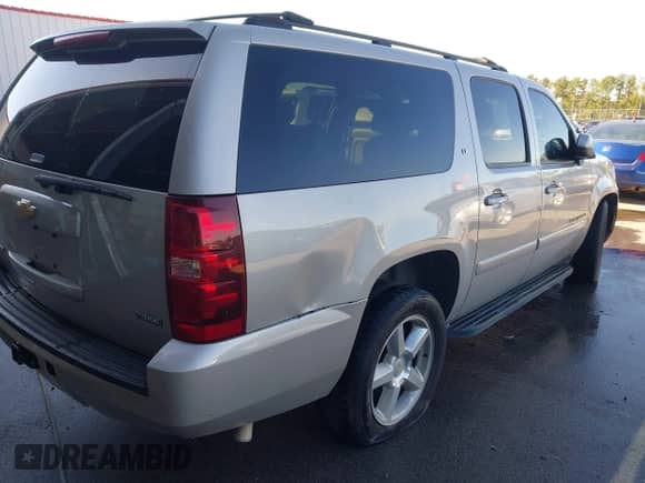 2007 Chevrolet Suburban LT with VIN 3GNFC160X7G216627, listed as a IAAI auction lot 43445940 with 312,650 mi miles and . Bid and sale history available at DreamBid. Image 6.