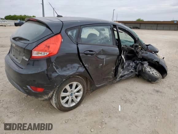 2011 Ford Fiesta SE with VIN 3FADP4EJ4BM142699, listed as a Copart auction lot 83821305 with 164,004 mi miles and Salvage title. Bid and sale history available at DreamBid. Image 3.