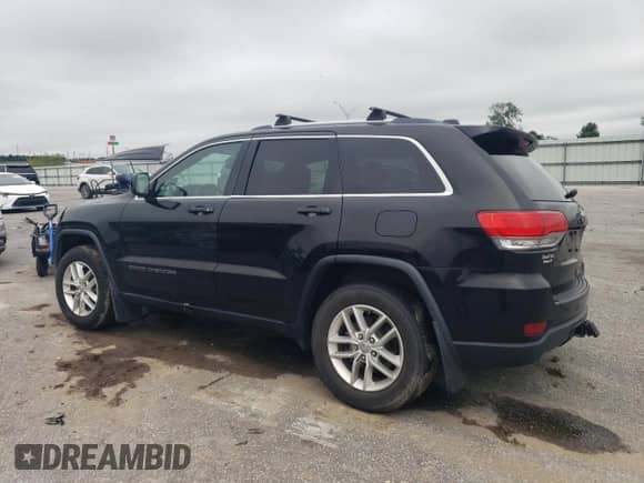 2017 Jeep Grand Cherokee Laredo with VIN 1C4RJEAG4HC656614, listed as a Copart auction lot 67652725 with 144,430 mi miles and Salvage title. Bid and sale history available at DreamBid. Image 2.