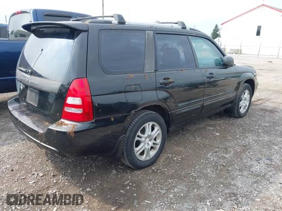 2004 Subaru Forester XT with VIN JF1SG69654H730661, listed as a IAAI auction lot 42940157 with 130,964 mi miles and . Bid and sale history available at DreamBid. Image 4.