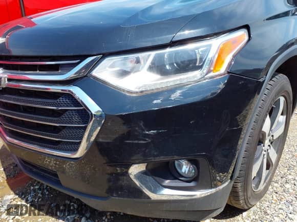 2018 Chevrolet Traverse LT z VIN 1GNEVHKW3JJ144443, wystawiony jako IAAI lot #41644506 z przebiegiem 68 081 mil mil oraz . Historia ofert i sprzedaży dostępna na DreamBid. Obrazek 16.