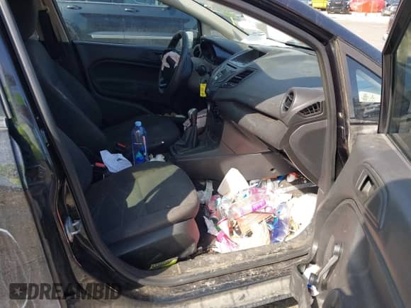2014 Ford Fiesta S with VIN 3FADP4AJ1EM221872, listed as a IAAI auction lot 41891521 with 69,500 mi miles and . Bid and sale history available at DreamBid. Image 5.