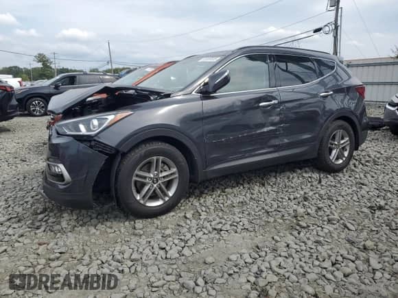2018 Hyundai Santa Fe 2.4L with VIN 5XYZUDLB1JG504486, listed as a Copart auction lot 82039555 with 72,685 mi miles and Salvage title. Bid and sale history available at DreamBid. Image 1.