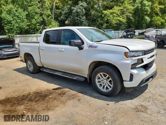 2020 Chevrolet Silverado 1500 RST with VIN 1GCUYEEDXLZ110671, listed as a Copart auction lot 70492325 with 79,074 mi miles and Salvage title. Bid and sale history available at DreamBid. Image 4.