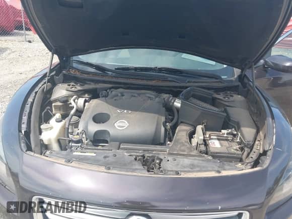 2013 Nissan Maxima SV z VIN 1N4AA5AP0DC816887, wystawiony jako IAAI lot #43182884 z przebiegiem 193 875 mil mil oraz . Historia ofert i sprzedaży dostępna na DreamBid. Obrazek 10.