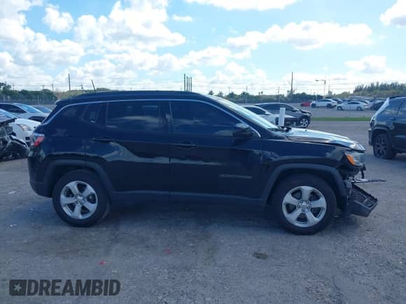 2020 Jeep Compass Latitude with VIN 3C4NJCBB4LT253364, listed as a IAAI auction lot 41565377 with 60,551 mi miles and . Bid and sale history available at DreamBid. Image 14.