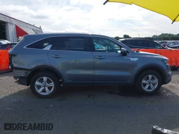 2023 Kia Sorento LX with VIN 5XYRGDLC7PG168609, listed as a IAAI auction lot 42893738 with 32,559 mi miles and . Bid and sale history available at DreamBid. Image 14.