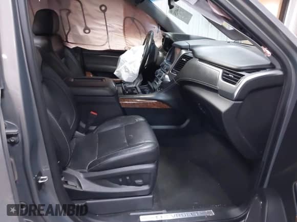 2018 Chevrolet Suburban Premier z VIN 1GNSKJKC9JR100134, wystawiony jako IAAI lot #41449255 z przebiegiem 111 528 mil mil oraz . Historia ofert i sprzedaży dostępna na DreamBid. Obrazek 5.