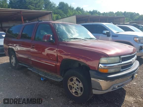 2003 Chevrolet Suburban LT with VIN 1GNEC16Z13J197680, listed as a IAAI auction lot 42558001 with Not provided miles and . Bid and sale history available at DreamBid. Image 1.