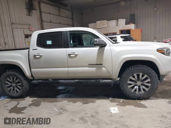 2021 Toyota Tacoma Limited with VIN 3TYGZ5AN6MT029957, listed as a IAAI auction lot 41517557 with 55,673 mi miles and . Bid and sale history available at DreamBid. Image 13.