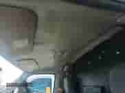 2010 Ford Econoline Cargo Commercial with VIN 1FTNE1EW8ADA91152, listed as a IAAI auction lot 43554413 with 126,365 mi miles and . Bid and sale history available at DreamBid. Image 4.