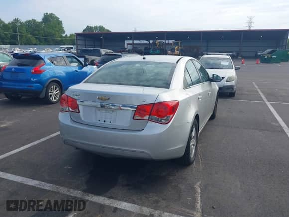 2014 Chevrolet Cruze LT with VIN 1G1PK5SB7E7187555, listed as a IAAI auction lot 42855158 with 178,554 mi miles and . Bid and sale history available at DreamBid. Image 4.