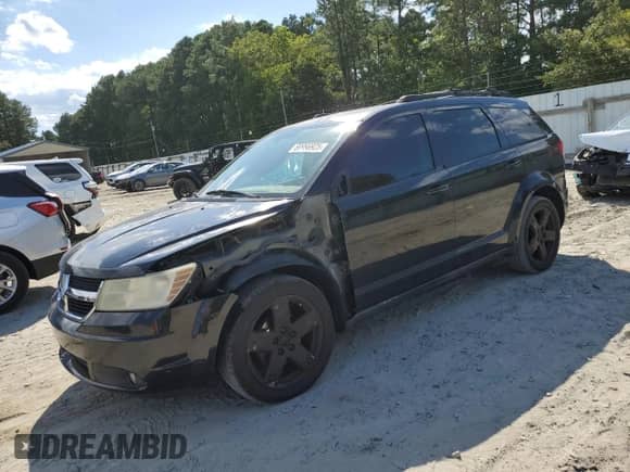 2010 Dodge Journey SXT with VIN 3D4PH5FV1AT125541, listed as a Copart auction lot 69966925 with 162,074 mi miles and Salvage title. Bid and sale history available at DreamBid. Image 1.