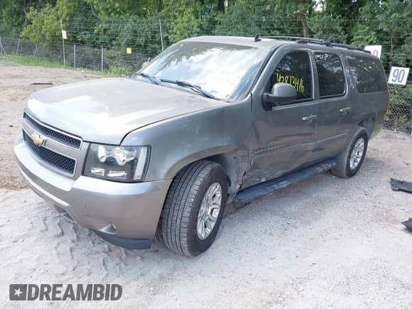 2007 Chevrolet Suburban LT with VIN 1GNFC16087J214521, listed as a IAAI auction lot 42813416 with 207,126 mi miles and . Bid and sale history available at DreamBid. Image 2.