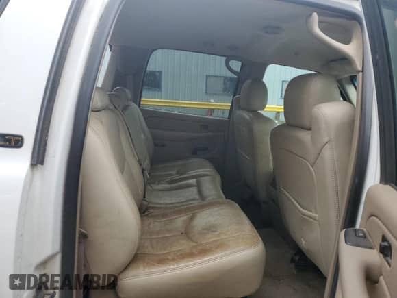 2004 Chevrolet Suburban LT z VIN 1GNFK16Z94J130902, wystawiony jako Copart lot #68551464 z przebiegiem 253 835 mil mil oraz Szkoda całkowita • Salvage title. Historia ofert i sprzedaży dostępna na DreamBid. Obrazek 11.