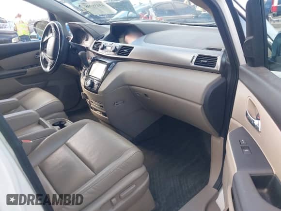 2016 Honda Odyssey Touring Elite z VIN 5FNRL5H9XGB047482, wystawiony jako IAAI lot #43439998 z przebiegiem 184 606 mil mil oraz . Historia ofert i sprzedaży dostępna na DreamBid. Obrazek 5.