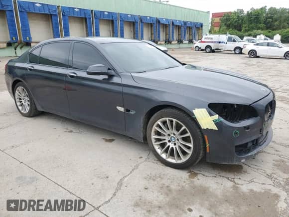 2013 BMW 7 Series 740Li xDrive with VIN WBAYF4C58DD127915, listed as a Copart auction lot 57797565 with 167,513 mi miles and Salvage title. Bid and sale history available at DreamBid. Image 4.