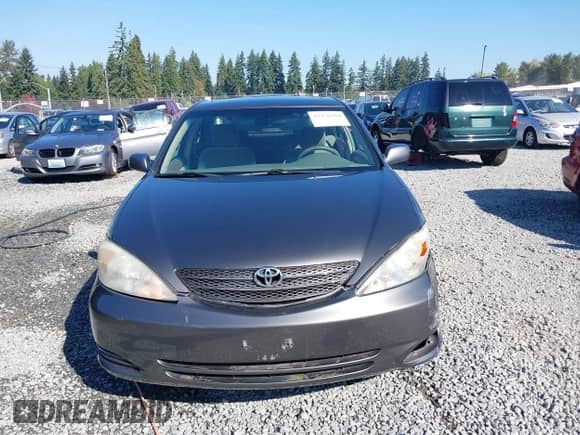 2003 Toyota Camry LE with VIN JTDBE32K530180767, listed as a IAAI auction lot 43276458 with 189,568 mi miles and . Bid and sale history available at DreamBid. Image 12.