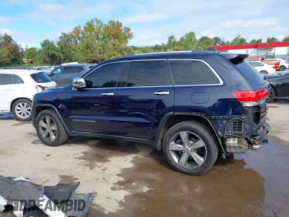 2014 Jeep Grand Cherokee Limited z VIN 1C4RJFBG0EC350283, wystawiony jako IAAI lot #43422250 z przebiegiem 154 985 mil mil oraz . Historia ofert i sprzedaży dostępna na DreamBid. Obrazek 15.