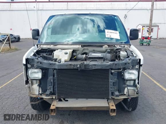 2007 Chevrolet Express Cargo z VIN 1GCFG15X271190003, wystawiony jako IAAI lot #42489542 z przebiegiem 177 998 mil mil oraz . Historia ofert i sprzedaży dostępna na DreamBid. Obrazek 13.