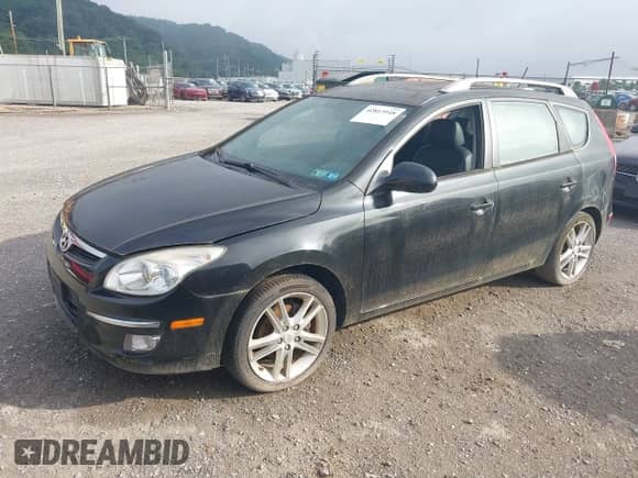 2012 Hyundai Elantra SE with VIN KMHDC8AE8CU129257, listed as a IAAI auction lot 42813948 with 94,513 mi miles and . Bid and sale history available at DreamBid. Image 2.