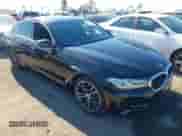 2021 BMW 5 Series 530i with VIN WBA53BH05MCF75051, listed as a IAAI auction lot 41336049 with 71,933 mi miles and . Bid and sale history available at DreamBid. Image 1.
