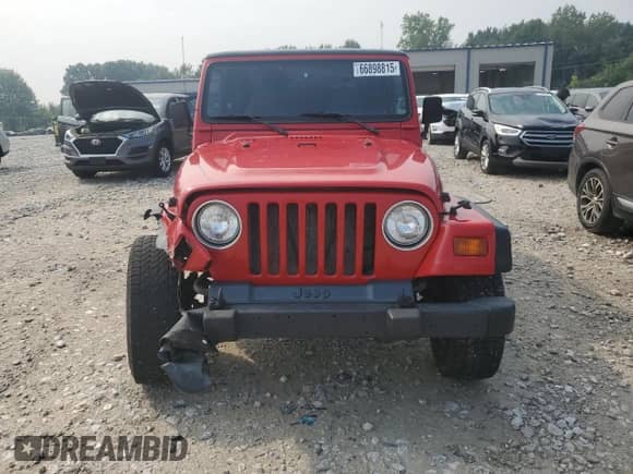 1998 Jeep Wrangler SE with VIN 1J4FY29P9WP736055, listed as a Copart auction lot 66898815 with 84,686 mi miles and Clean title. Bid and sale history available at DreamBid. Image 5.