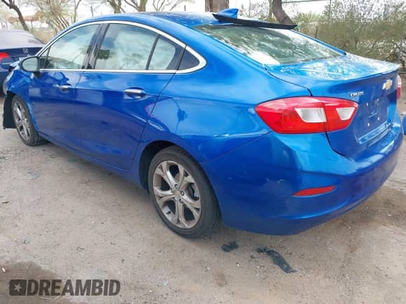 2016 Chevrolet Cruze Premier z VIN 1G1BG5SM3G7271551, wystawiony jako IAAI lot #42988853 z przebiegiem 87 746 mil mil oraz . Historia ofert i sprzedaży dostępna na DreamBid. Obrazek 3.